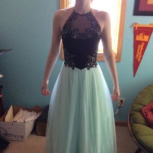 Black halter top dress with blue skirt